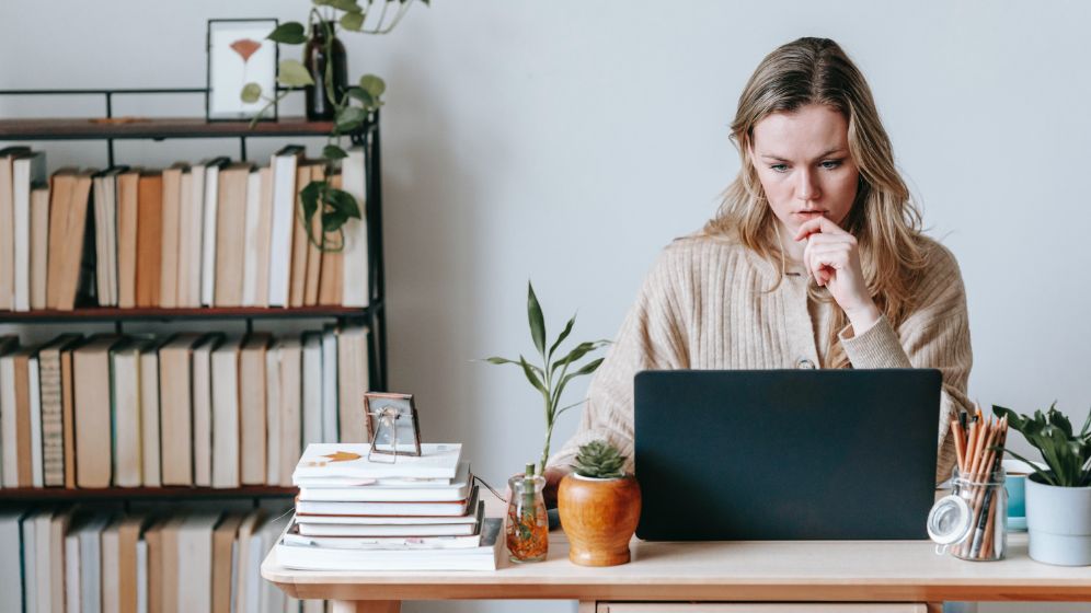 Woman working at home on laptop