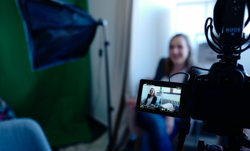 Woman recording a video resume