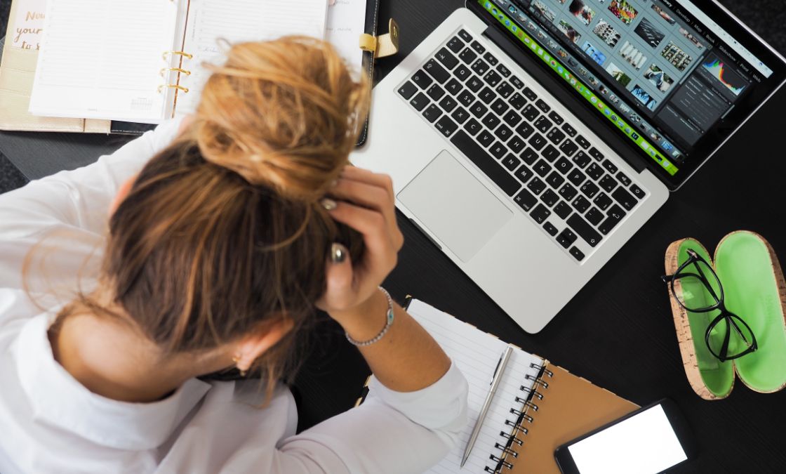 Student frustrated at laptop