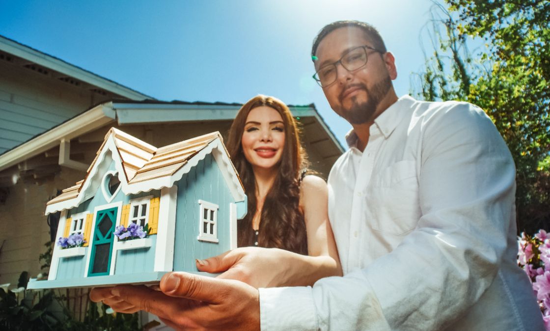 Man and woman buying new home
