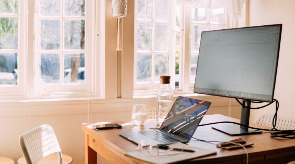 Home office desk with computer and monitor