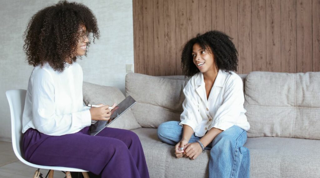 Woman speaking with a licensed therapist