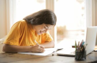 College student working on a paper